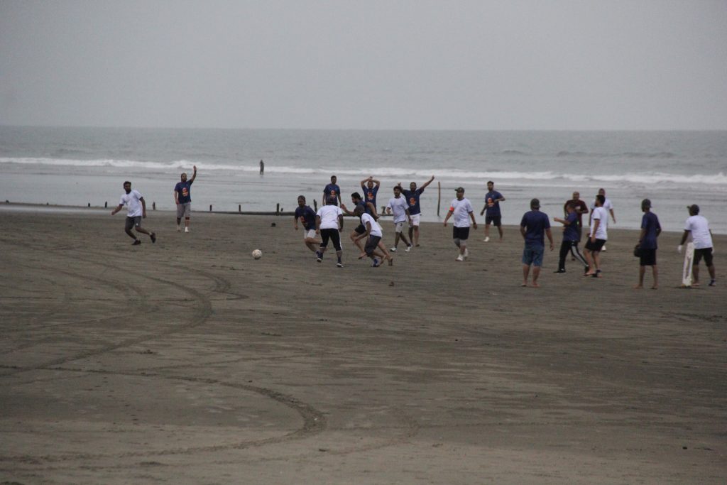 Friendly beach football match